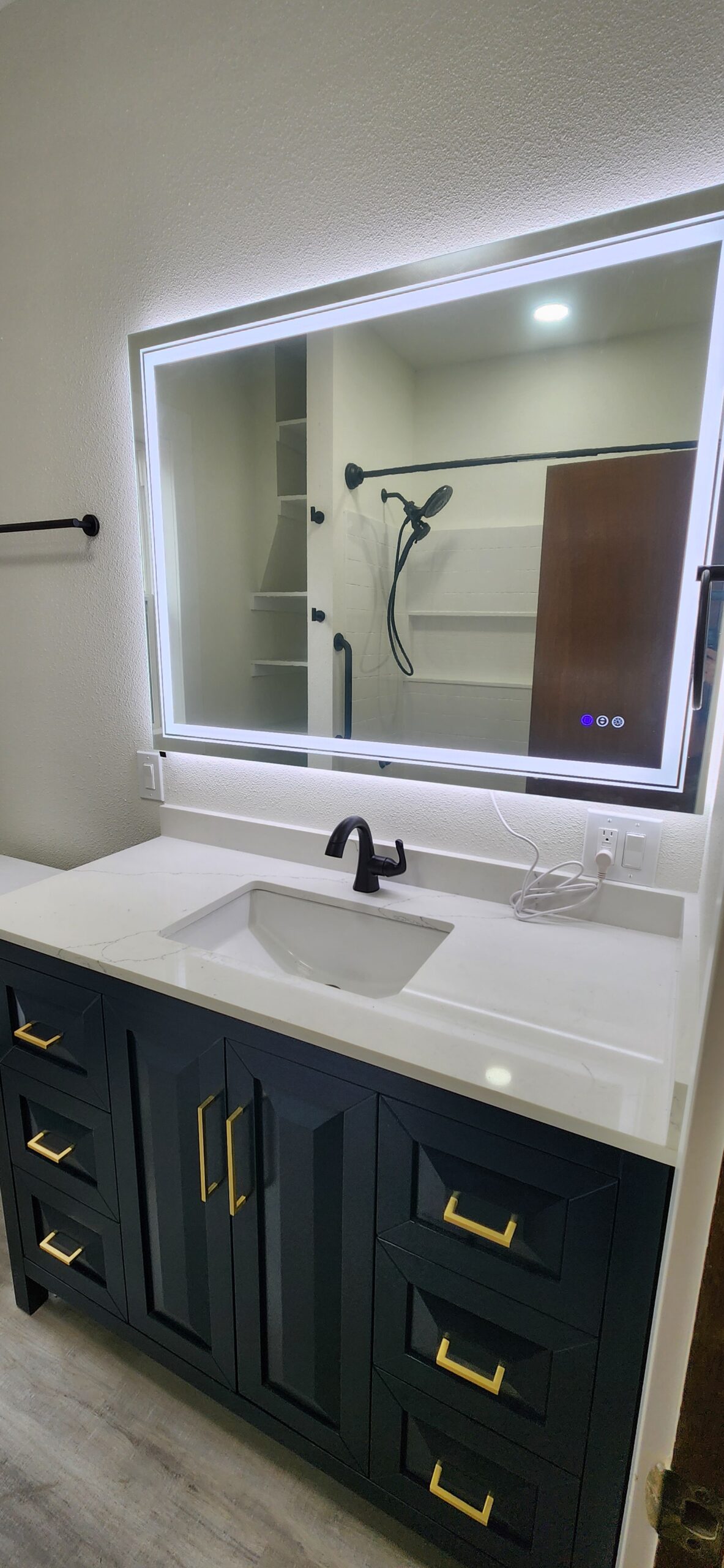 Bathroom remodel with tiled walk-in shower in Northern Colorado by Blue Springs Construction