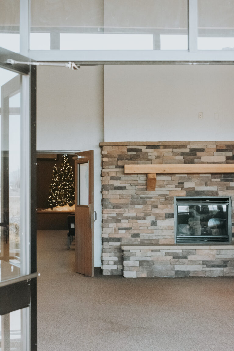 Stone fireplace in a finished Blue Springs remodel