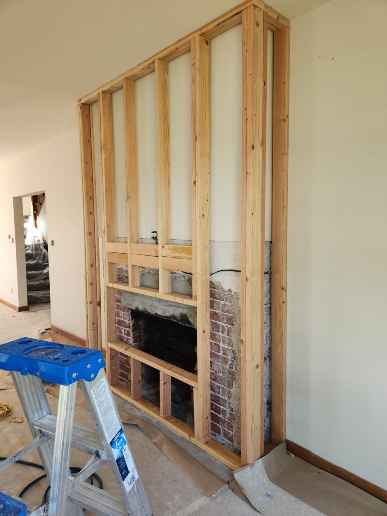 Fireplace framing in progress on a Blue Springs project