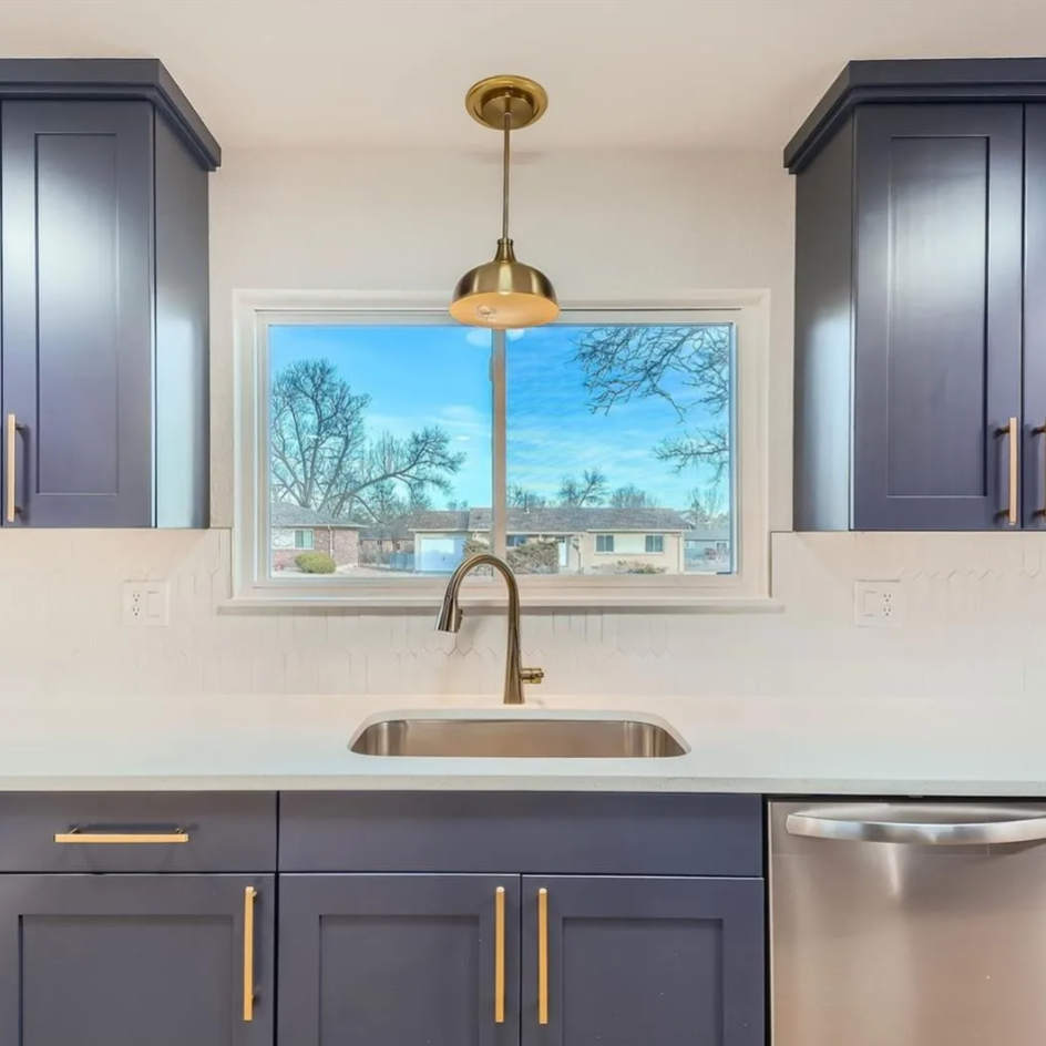 Custom kitchen cabinetry and quartz countertop detail in Northern Colorado by Blue Springs Construction