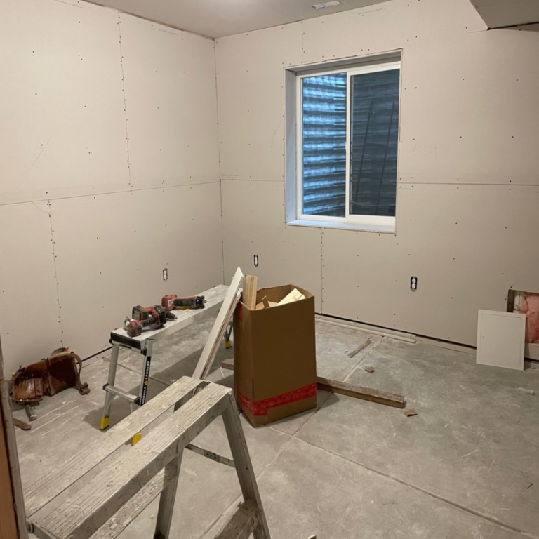 Bedroom at the drywall stage during a remodel